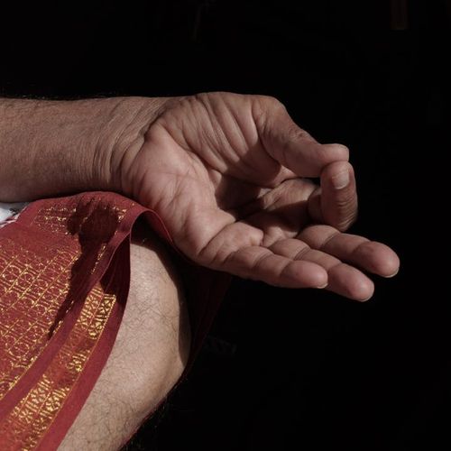 Close up of yoga practitioner hands in mudra gesture